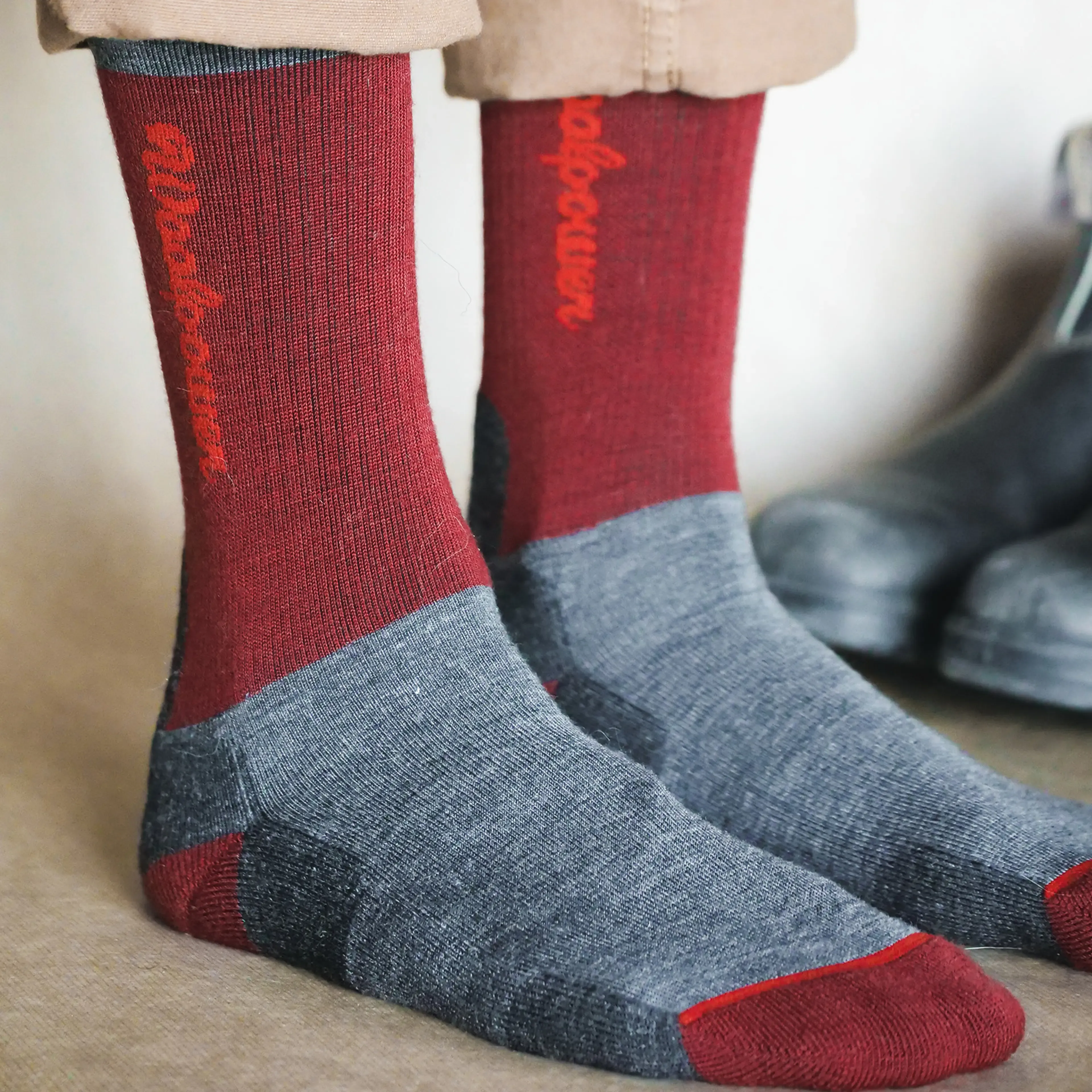 Woolpower Socks Logo Motion, rust red
